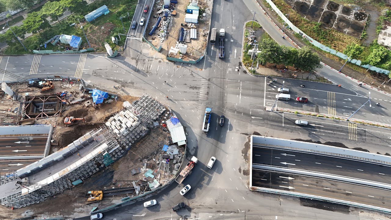 High angle shot of road construction and traffic in Ho Chi Minh City.